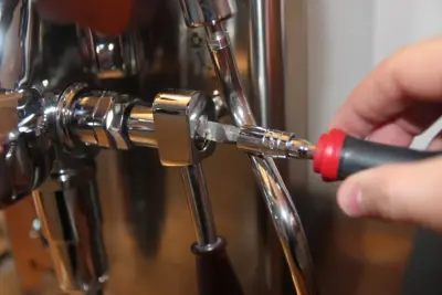 How to lubricate the lever of an e61 machine?