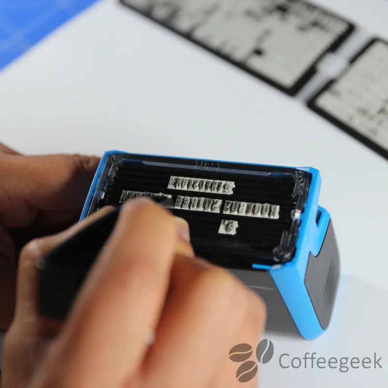 Placing letters on the customizable ink stamp