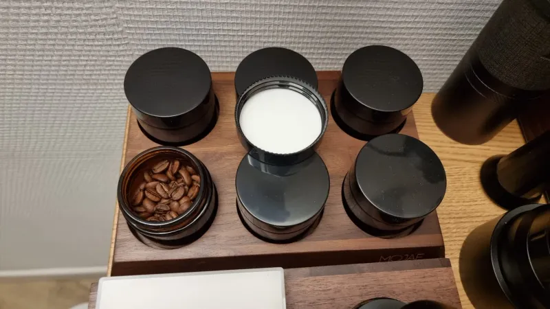 Set of coffee dosing containers
