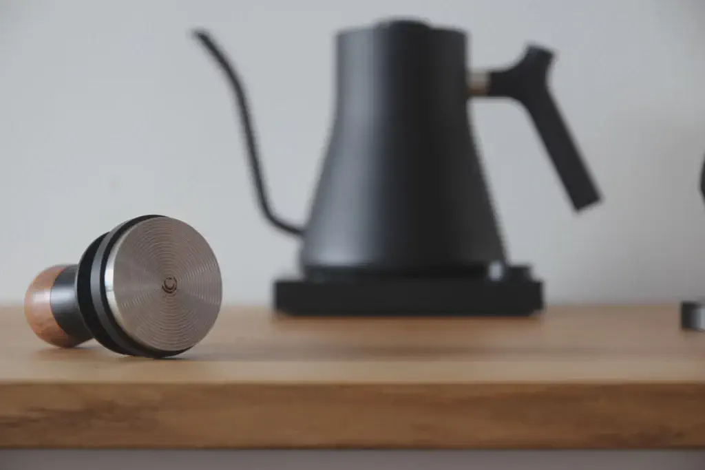 Grooved tamper base