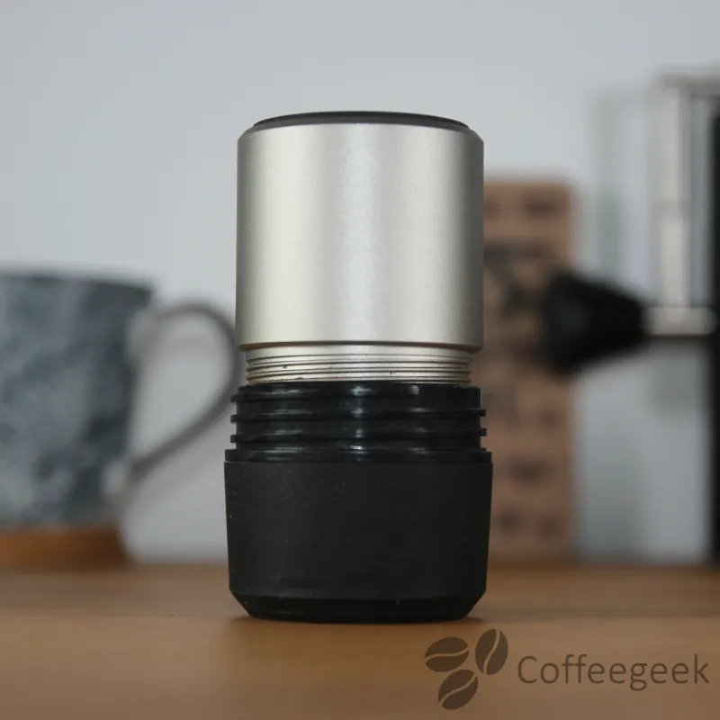 The grinder's grounds container fits perfectly into the Pixapresso filter