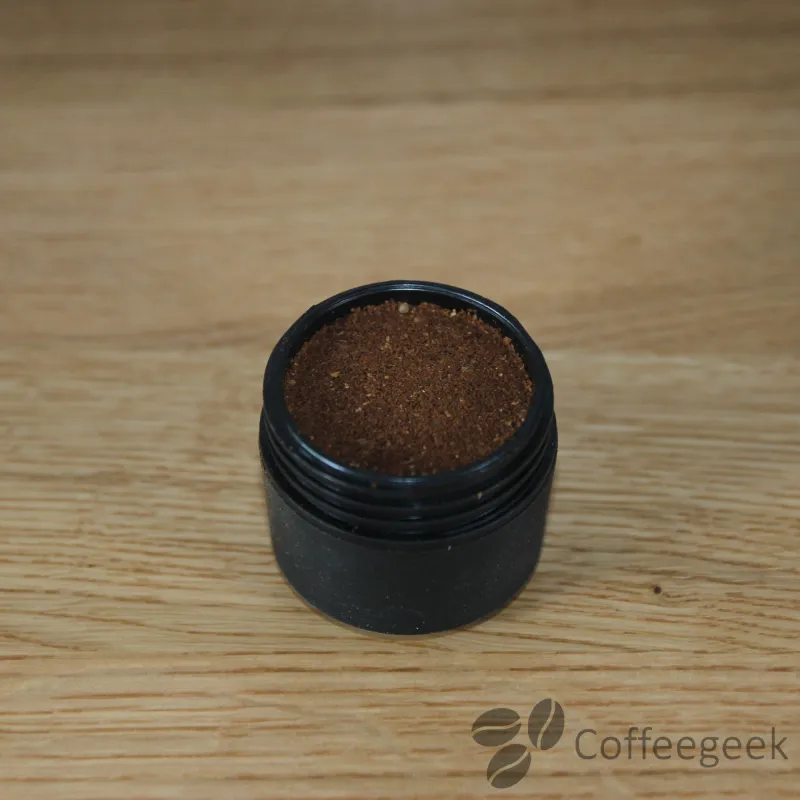 The filter is filled with 16 g of freshly ground coffee