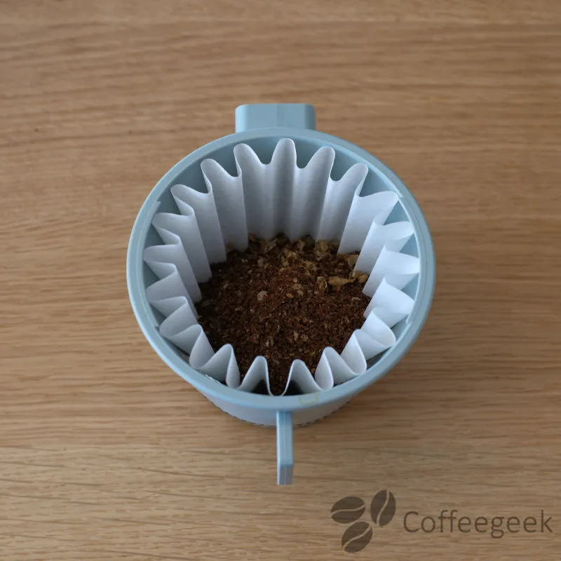 Filter coffee grind from the Timemore Bricks 01S, regular texture for V60 pour-over