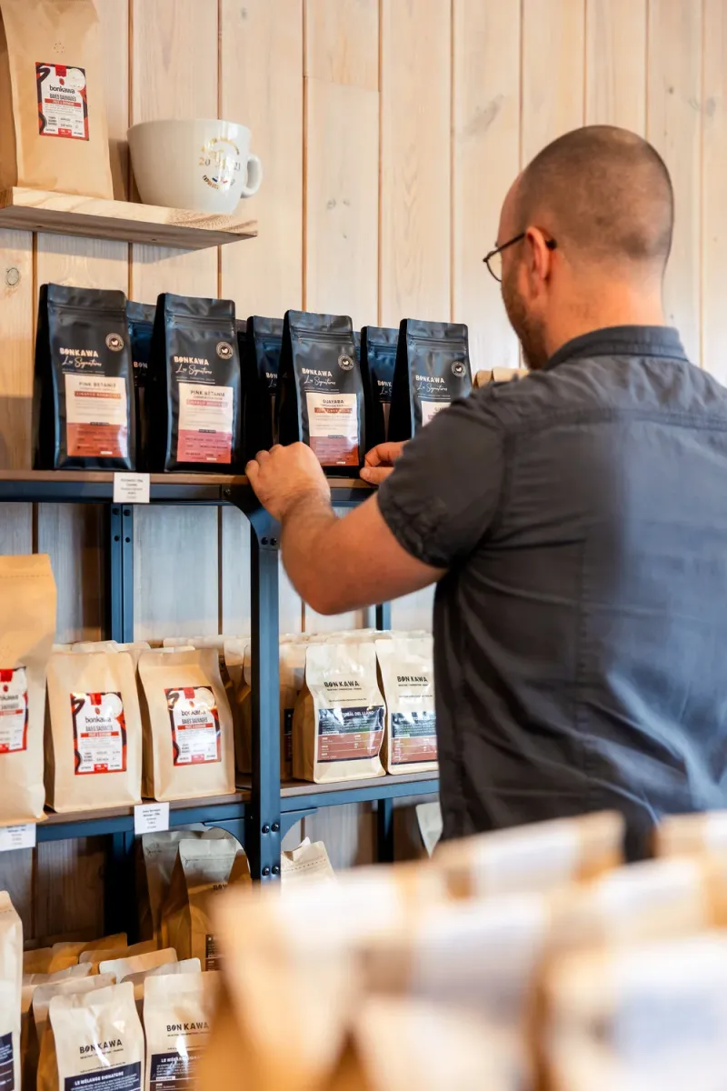 The two Signatures coffee bags side by side, showcasing their unique packaging design