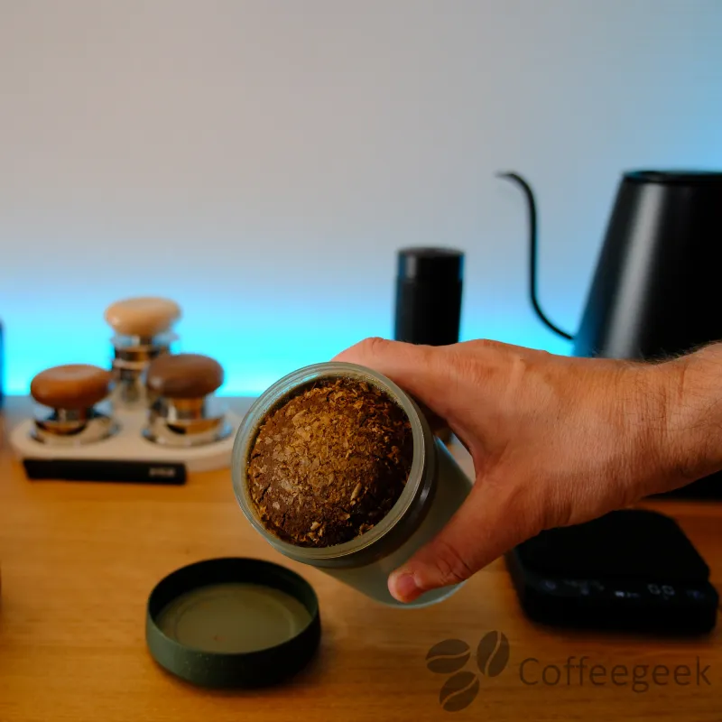 The coffee puck after removing the cap
